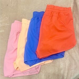 Women's Athletic Shorts in Pink, Peach, Blue, and Orange
